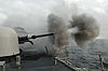 US Navy 110606-N-NL541-341 The MK-75 76mm mounted gun aboard USS Thach (FFG 43) is fired during a live-fire exercise off the coast of Chile.jpg
